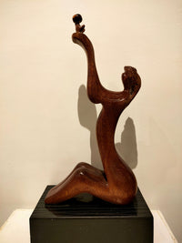 Baker Al Essa — Wooden sculpture, 25 × 40 cm (representative image)