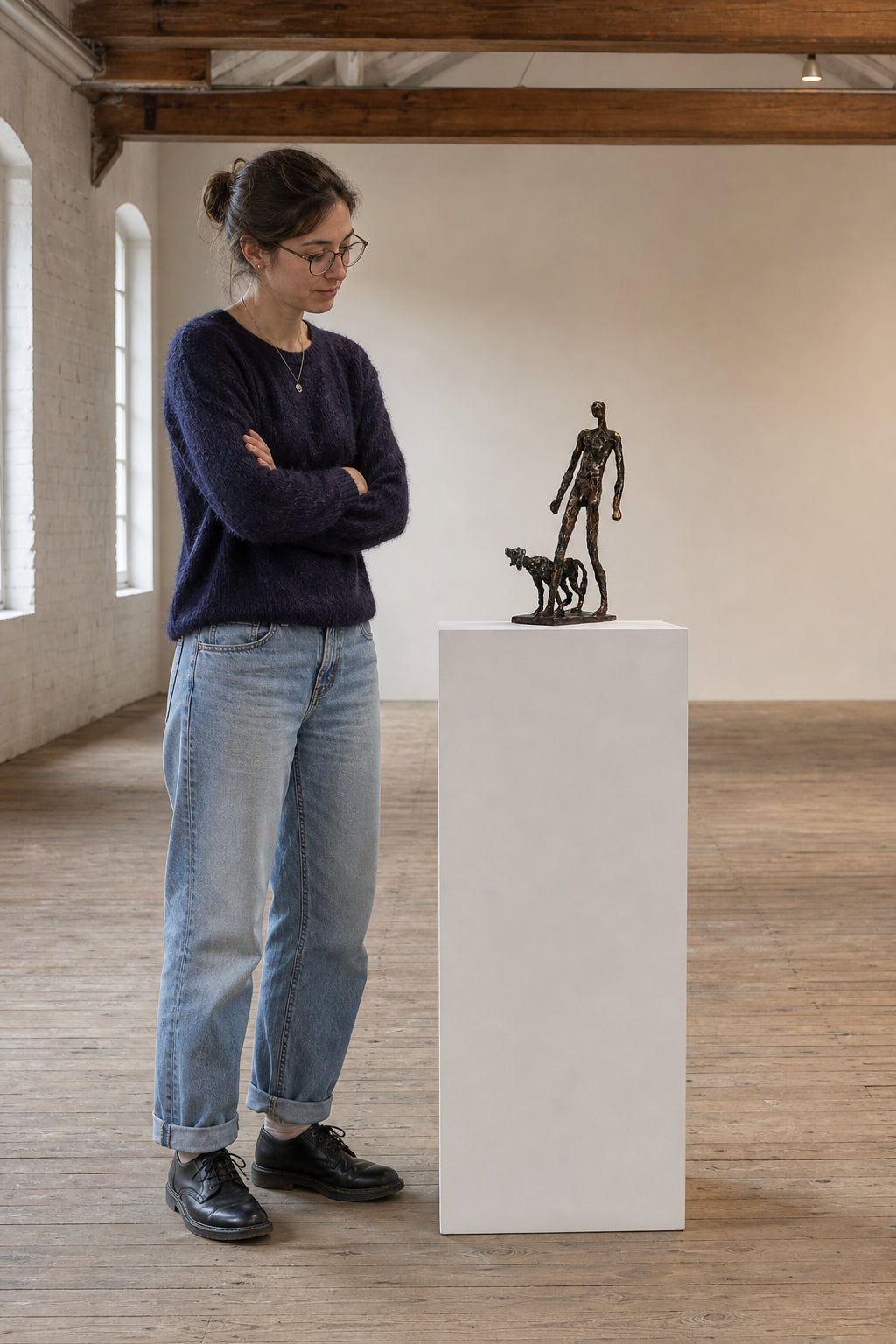 Standing Man with Dog Bronze Sculpture - shown to scale