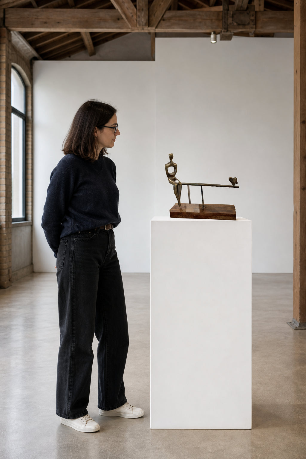 Seated Figure with Small Animal Bronze - shown to scale